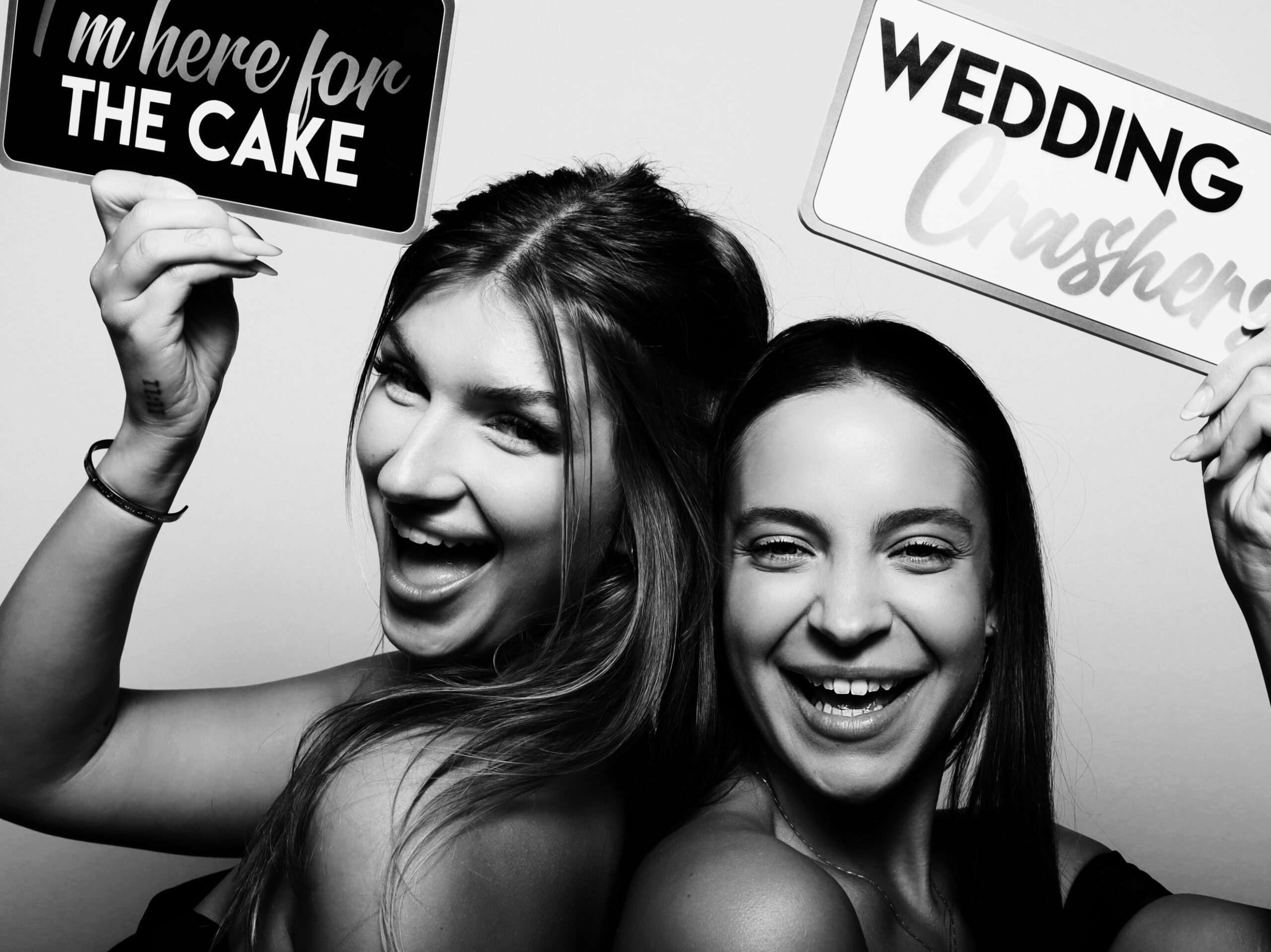 Candid wedding photo booth moment